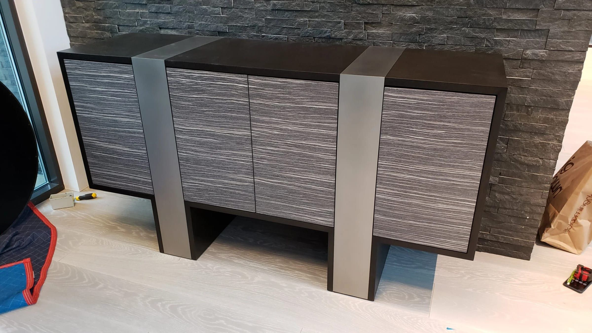 Sideboard with brushed metal side panels